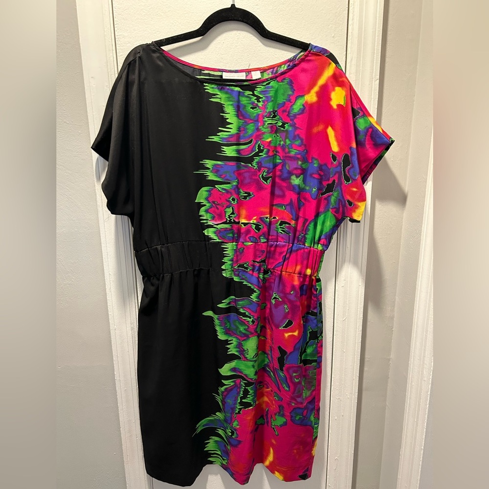 Black dress featuring color splashing design.